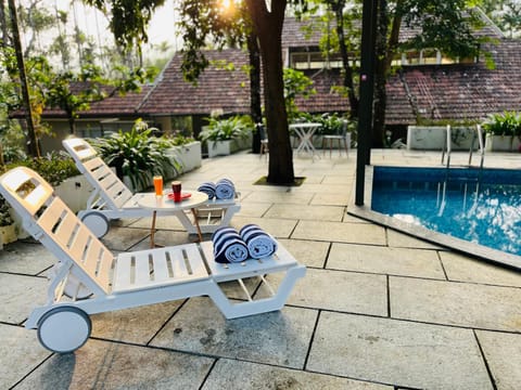 Swimming pool, sunbed