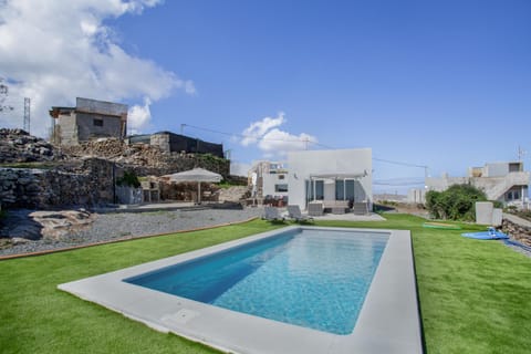 Property building, Living room, Swimming pool