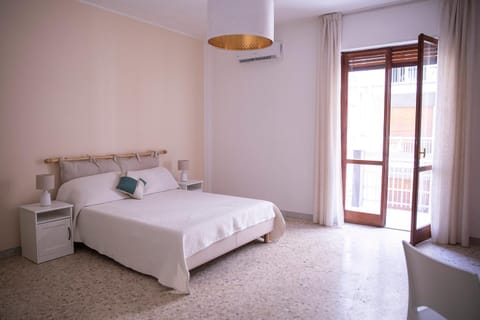 Bed, Photo of the whole room, Bedroom, towels, air conditioner