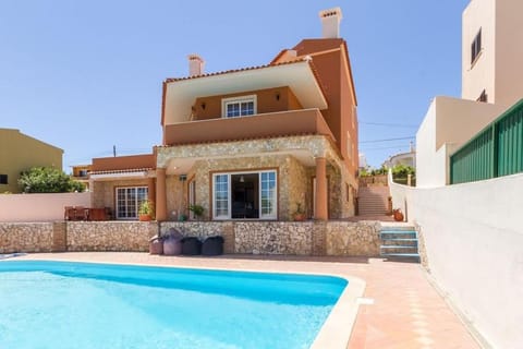 Property building, Patio, Day, Pool view, Swimming pool