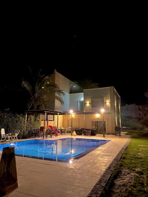 Property building, Night, Pool view, Swimming pool