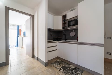 Kitchen or kitchenette, oven, stove