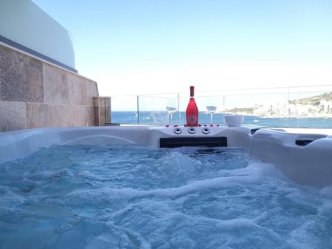 DuplexPenthouse seafront with hot tub by Homely Apartment in Saint Paul's Bay