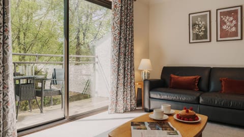 View (from property/room), Balcony/Terrace, Living room, Seating area, Dining area, Garden view