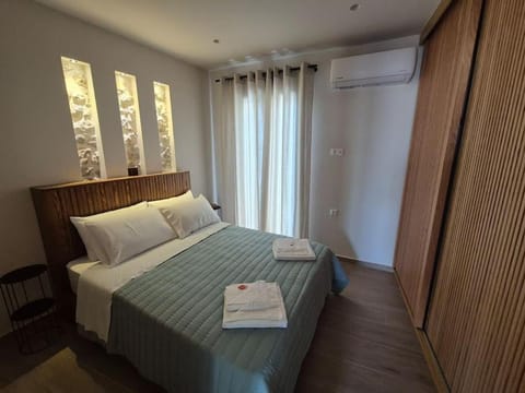 Bed, Bedroom, towels, wardrobe, air conditioner