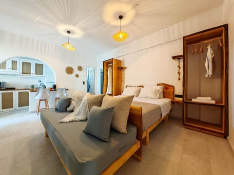 Bed, Living room, Photo of the whole room, Seating area, Bedroom, towels, wardrobe