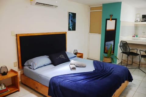 Bed, towels, air conditioner