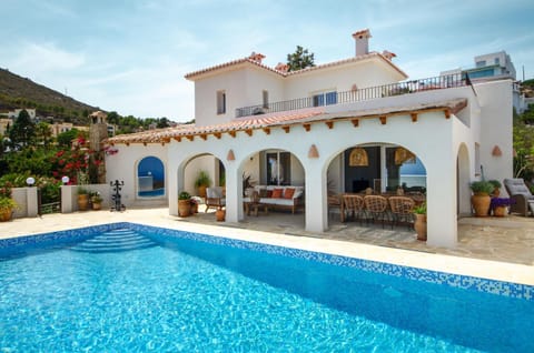 Property building, Living room, Swimming pool