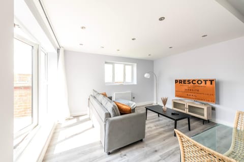 Living room, Seating area, Text overlay