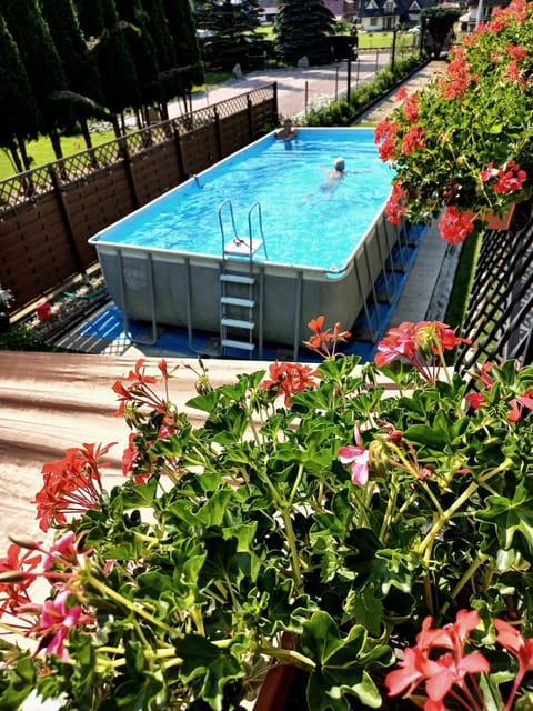 Property building, Activities, Activities, Summer, Seating area, Swimming pool