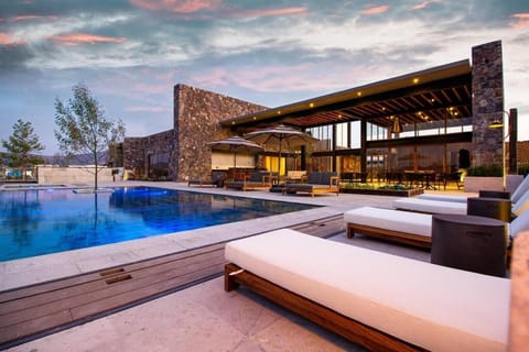 Property building, Patio, Day, Natural landscape, Seating area, Pool view, Swimming pool, sunbed