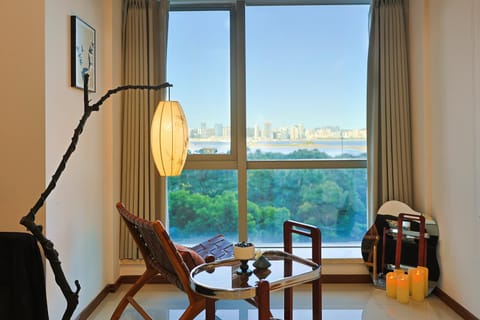 Natural landscape, View (from property/room), Living room, Seating area, Sea view
