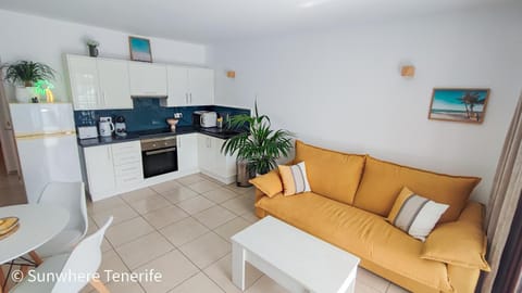 Kitchen or kitchenette, Living room, Seating area, Dining area, oven, stove, toaster