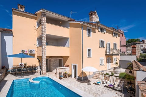 Property building, Patio, Day, View (from property/room), Balcony/Terrace, Pool view, Swimming pool, sunbed