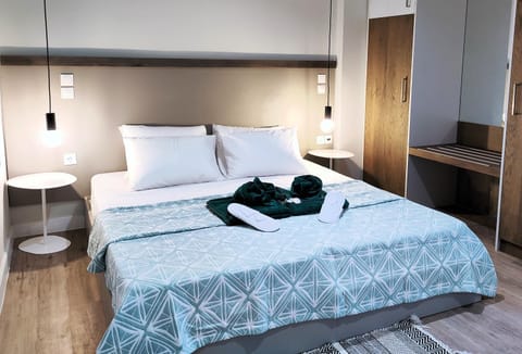 Bed, Photo of the whole room, Bedroom, towels, wardrobe