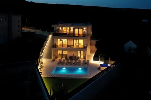 Property building, Night, Pool view, Swimming pool, sunbed