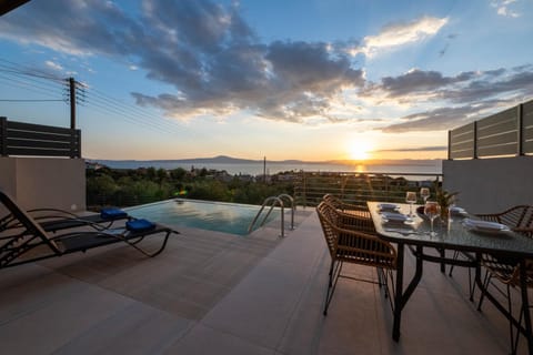 Patio, View (from property/room), Pool view, Sea view, Swimming pool, Sunset, sunbed