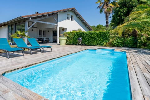 Property building, Living room, Swimming pool