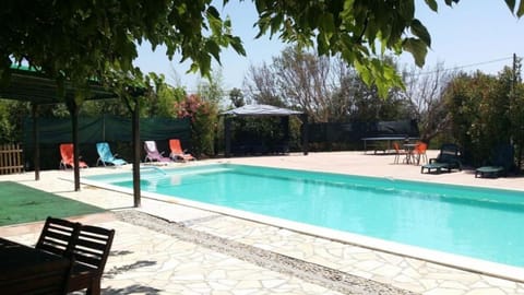 Property building, Living room, Swimming pool