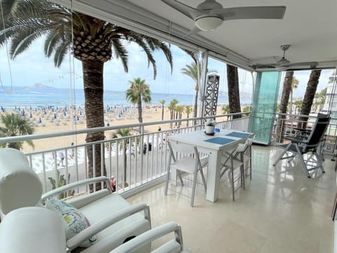 View (from property/room), Living room, Seating area, Dining area, Beach, Sea view