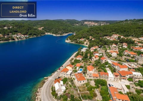 Property building, Nearby landmark, Day, Neighbourhood, Natural landscape, Bird's eye view, Beach, City view, Sea view