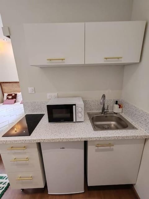 Kitchen or kitchenette, stove