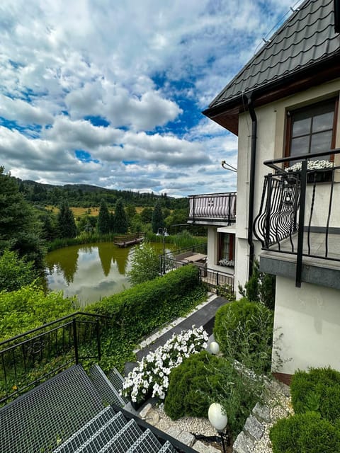 Property building, Day, Natural landscape, Garden, View (from property/room), Lake view