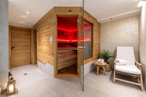 Bed, Sauna, Seating area, Bedroom, towels