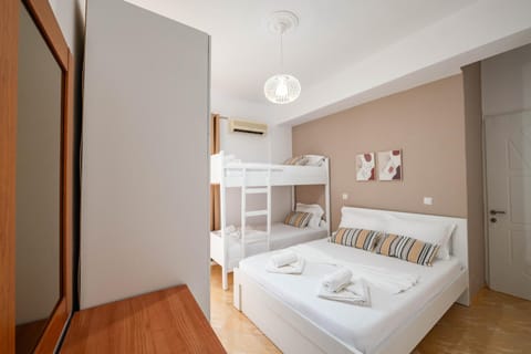 Bed, Photo of the whole room, Bedroom, bunk bed, towels, wardrobe, air conditioner