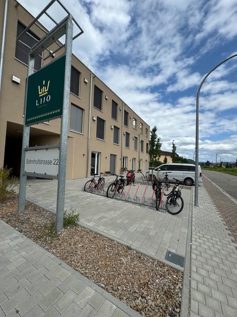 Property building, Day, Cycling, Street view, Location, Parking