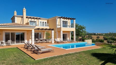 Property building, Living room, Swimming pool