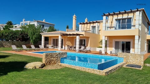 Property building, Living room, Swimming pool