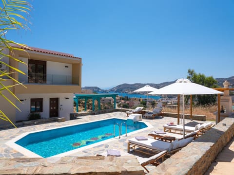 Property building, Patio, Day, Natural landscape, Mountain view, Pool view, Sea view, Swimming pool, sunbed