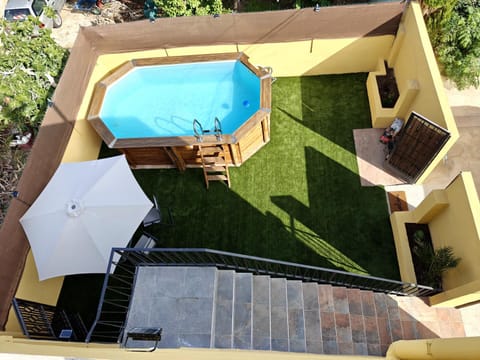 Property building, Patio, Day, Garden, Garden view, Pool view, Swimming pool, sunbed