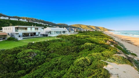 Property building, Day, Natural landscape, Beach, Sea view