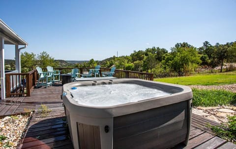 Large patio and hot tub near wine country House in Rio Grande