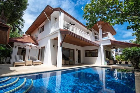 Property building, Patio, Pool view, Swimming pool, sunbed