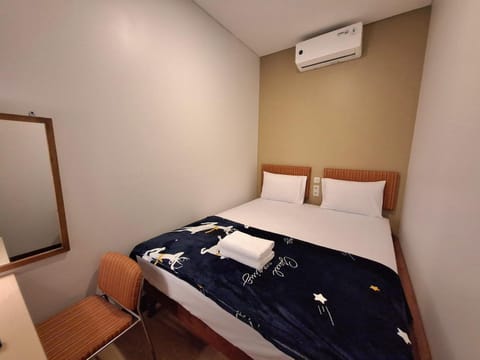 Bed, Photo of the whole room, Bedroom, towels, wardrobe, air conditioner