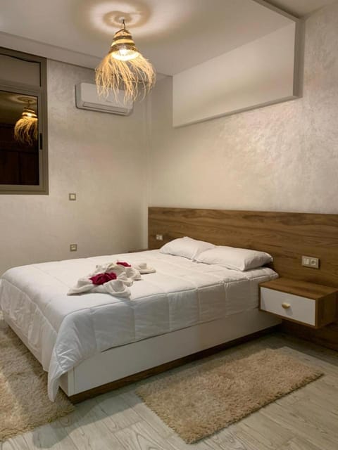 Bed, Photo of the whole room, Bedroom, towels, air conditioner