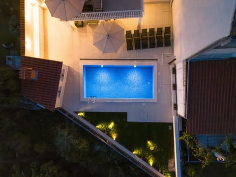 Property building, Night, Pool view, Swimming pool