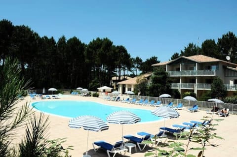 Property building, Living room, Swimming pool