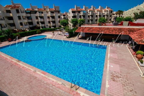 Property building, Living room, Swimming pool