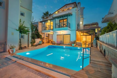 Property building, Patio, Night, Pool view, Swimming pool, Swimming pool