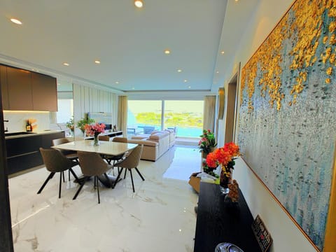 TV and multimedia, Kitchen or kitchenette, Living room, Dining area, City view, Garden view, Garden view, Sea view, Sea view, Entertainment, Dinner, Sunset, kitchen, air conditioner