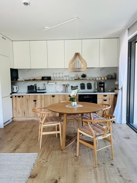 Kitchen or kitchenette, Dining area, dishwasher, stove, toaster