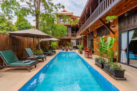 Property building, Pool view, Swimming pool, sunbed