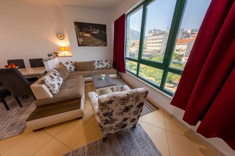 View (from property/room), Living room, Seating area, City view