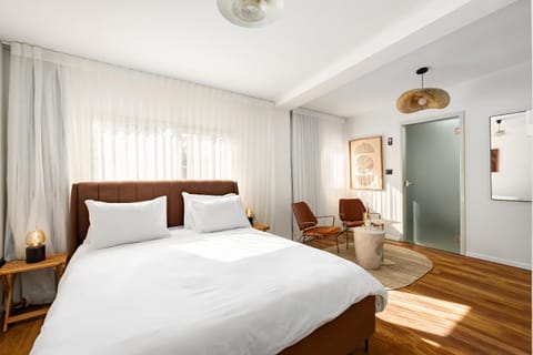 Bed, Living room, Seating area, Bedroom