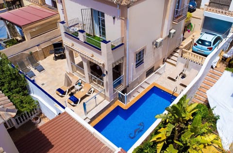 Property building, Living room, Swimming pool
