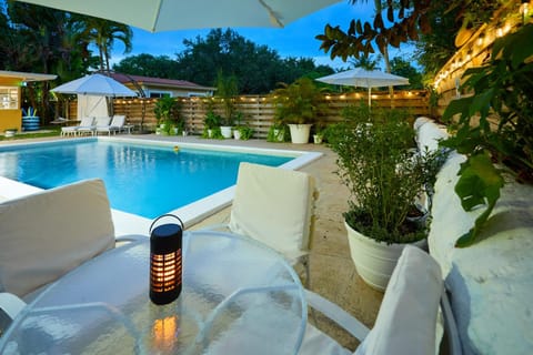 Property building, Patio, Seating area, Pool view, Swimming pool, sunbed